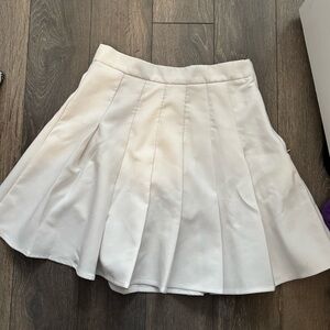 White pleated skirt